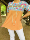 Orange top with blue floral and sequin stripe