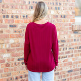 Maroon textured long sleeve top