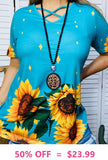 Turquoise top with sunflowers