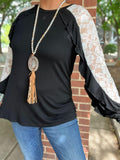 Black Top with ruffle and white lace sleeves
