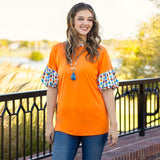 Orange Top with tribal bubble sleeves