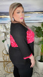 Black waffle knit top with pink zebra