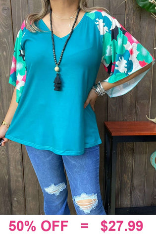 Teal top with printed bell sleeves