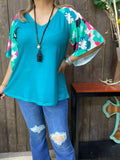 Teal top with printed bell sleeves