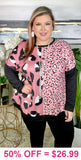 Pink leopard prints, black long sleeve top