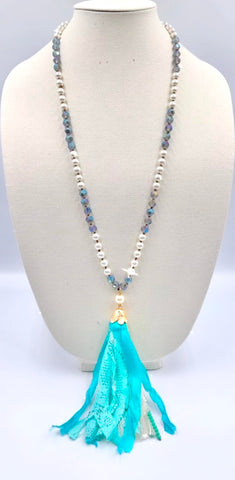 Pearl necklace with turquoise tassel