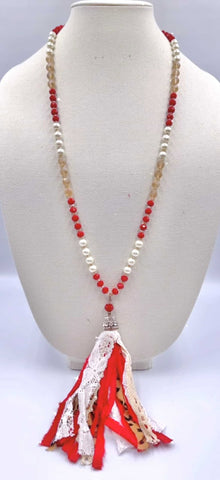 Pearl and red necklace with leopard tassel