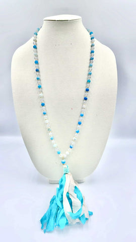 Frosted Beaded necklace with Blue fabric tassel