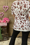 'Cattle & Chaos" cow print top