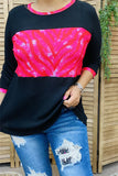 Black waffle knit top with pink zebra