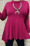 Maroon tunic top with shark bite hem