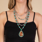 Turquoise Layered Necklace with cow hide pendant