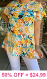 Yellow floral top with ruffle hem