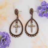 Copper teardrop earrings with cream dangle cross