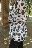 Black and White cow print top with sheer long sleeves