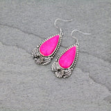 Pink teardrop stone earrings with silver setting border