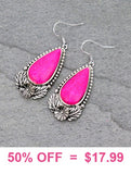 Pink teardrop stone earrings with silver setting border