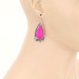 Pink teardrop stone earrings with silver setting border