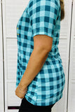 Turquoise Checkered top with tribal graphic